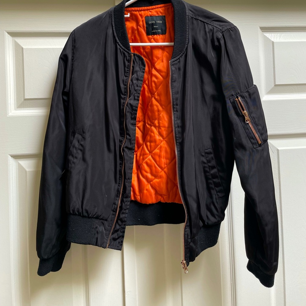 Black & Orange bomber jacket with gold rose zippers.
